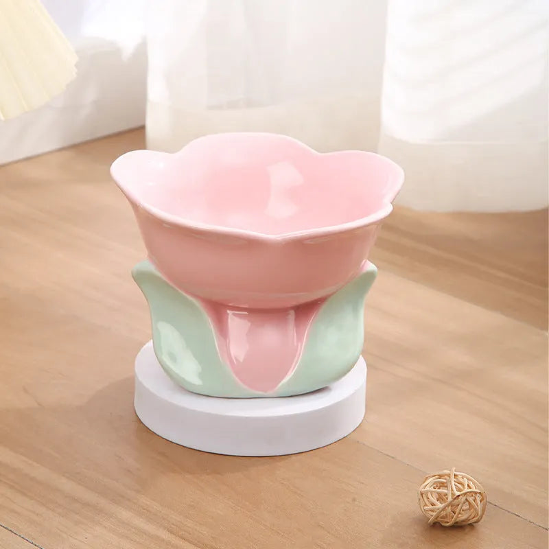 Blue and pink floral patterned ceramic raised pet bowl with non-slip base for cats and small dogs