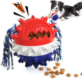 Blue and red TPR rubber dog chew toy with dental bumps, squeaker, and treat dispenser hole.
