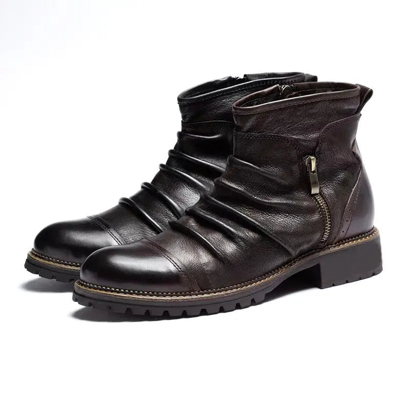 Men's black side-zip cowboy boots with embossed texture and a mid-height horseshoe rubber heel.