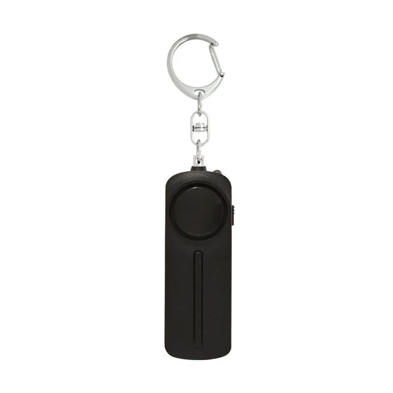 Personal safety alarm device measuring 86×30×20 mm with 130 dB sound output in pink colour option