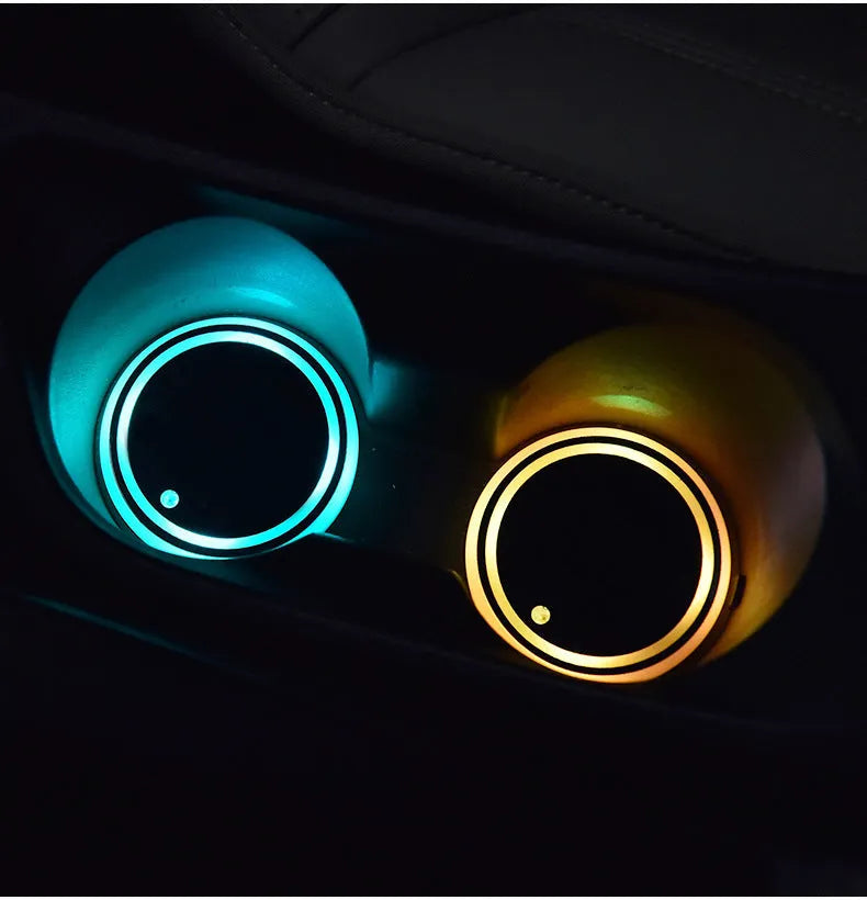 Colourful LED light-up coaster for car cup holder showing seven light colours and USB cable.