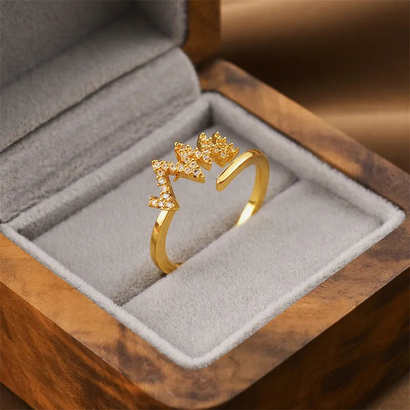 Korean women's adjustable open geometric ring with gold electroplated finish on copper