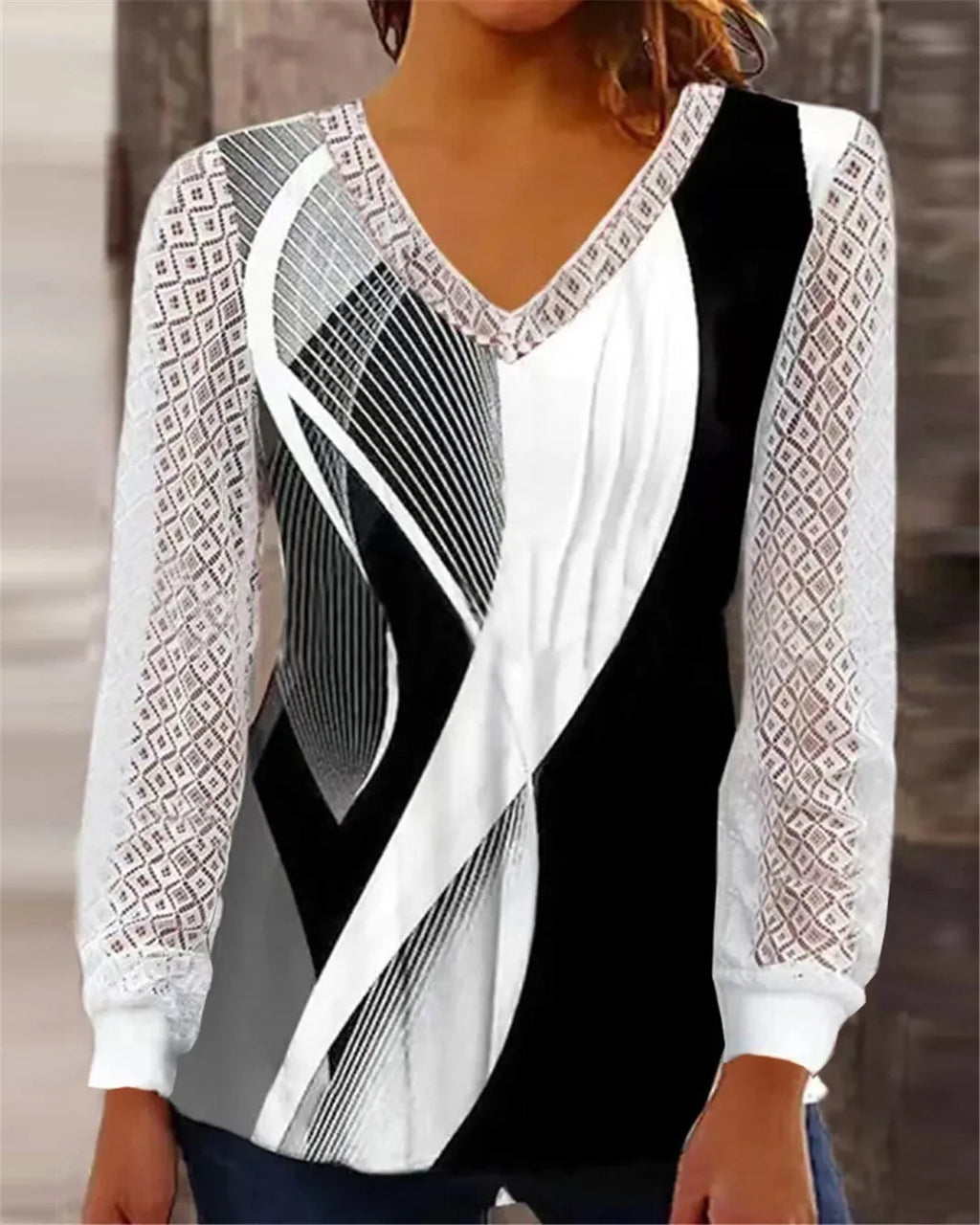 Purple V-neck loose top with hollow-out lace print and long sleeves