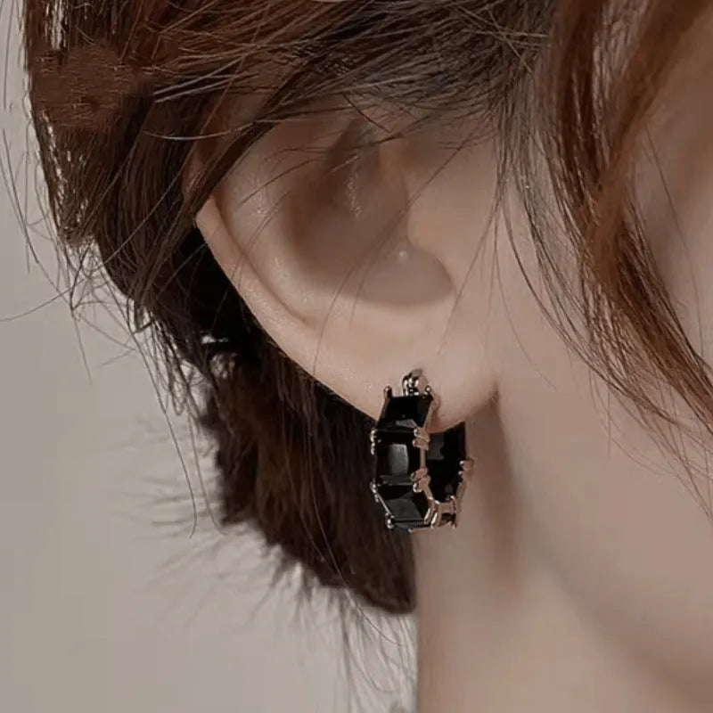 Geometric U-shaped gold electroplated copper ear rings with round black zircon settings