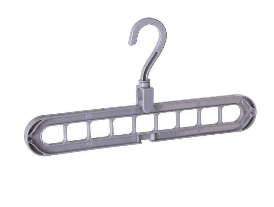 Plastic clothes hanger with rotating hook in assorted colours on white background