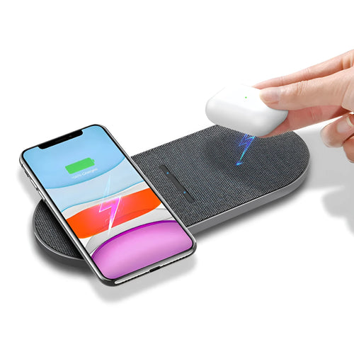 Black 10W dual wireless charging pad set with LED lights, shown charging two smartphones.