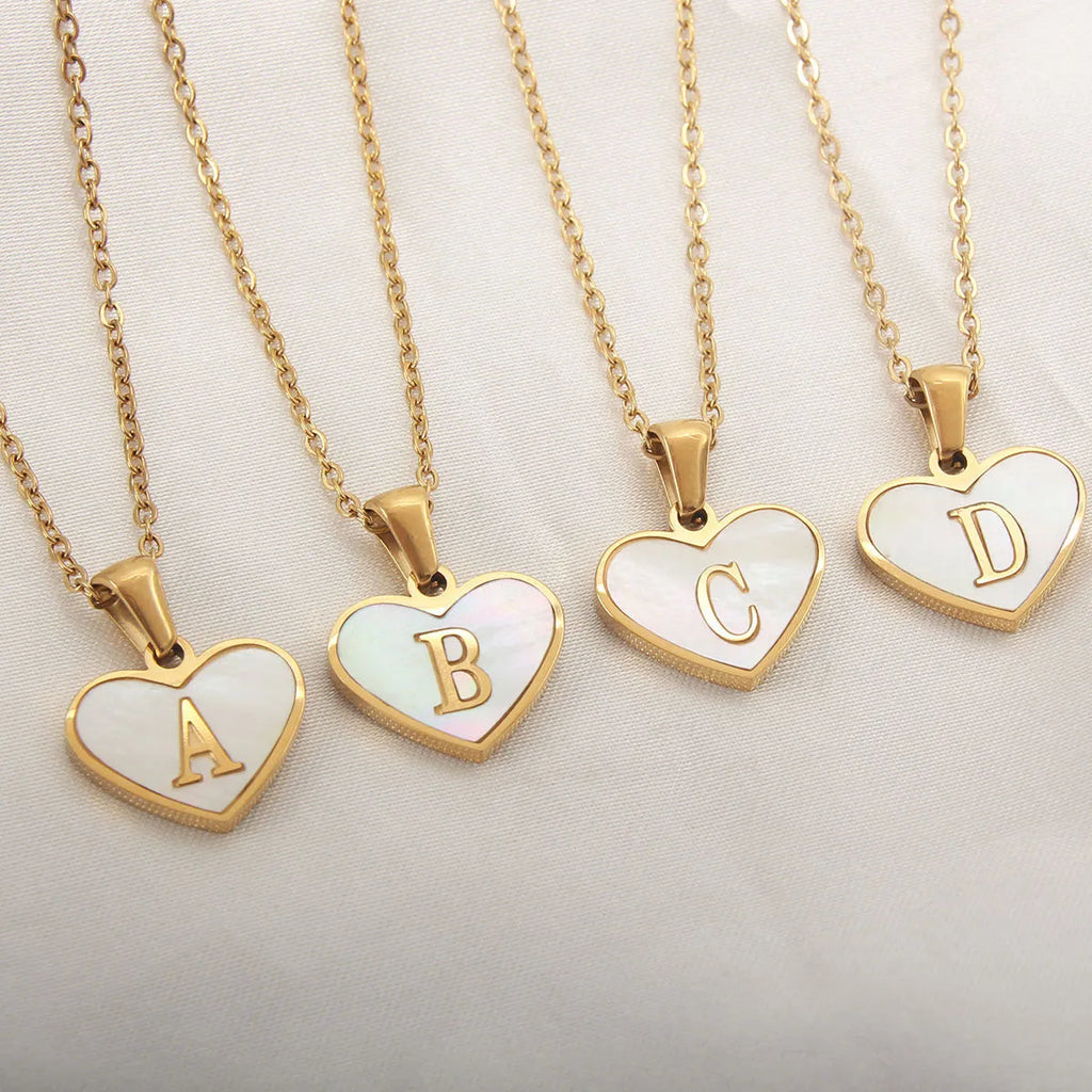 Gold plated personalised heart necklace with white shell on a 45cm chain