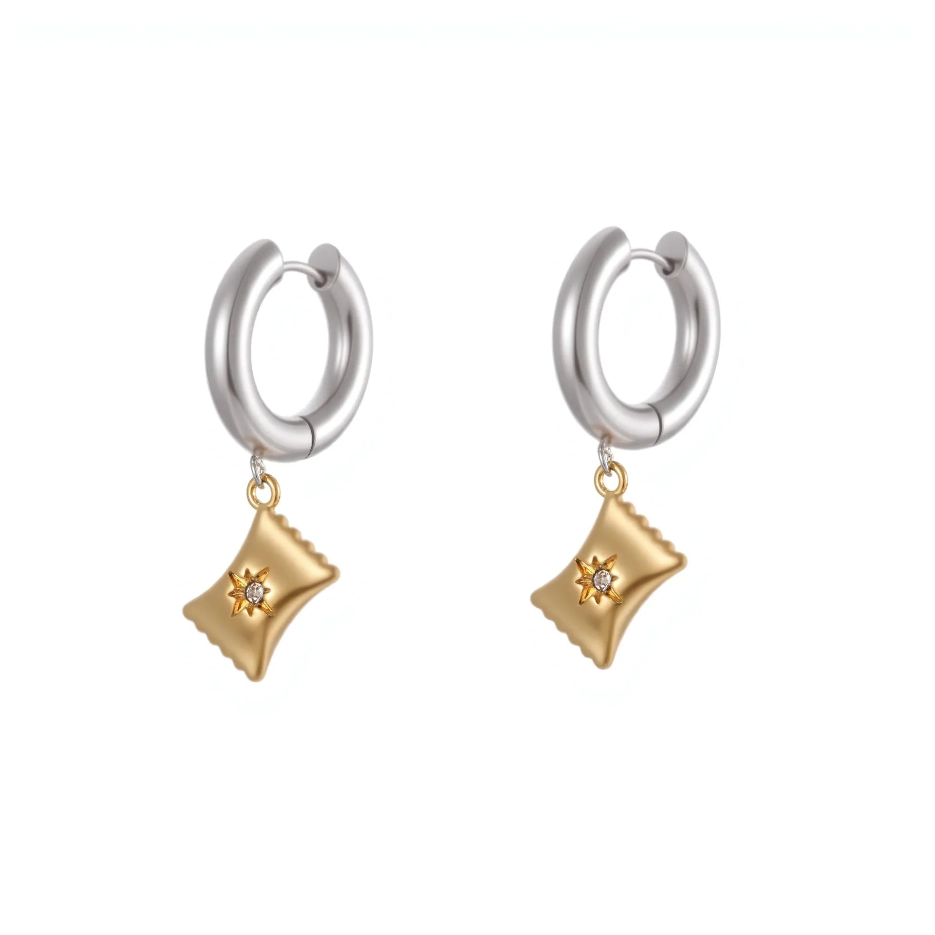 A pair of stainless steel earrings with an 18K gold colour finish, shown in a Christmas tree shape and a heart shape.