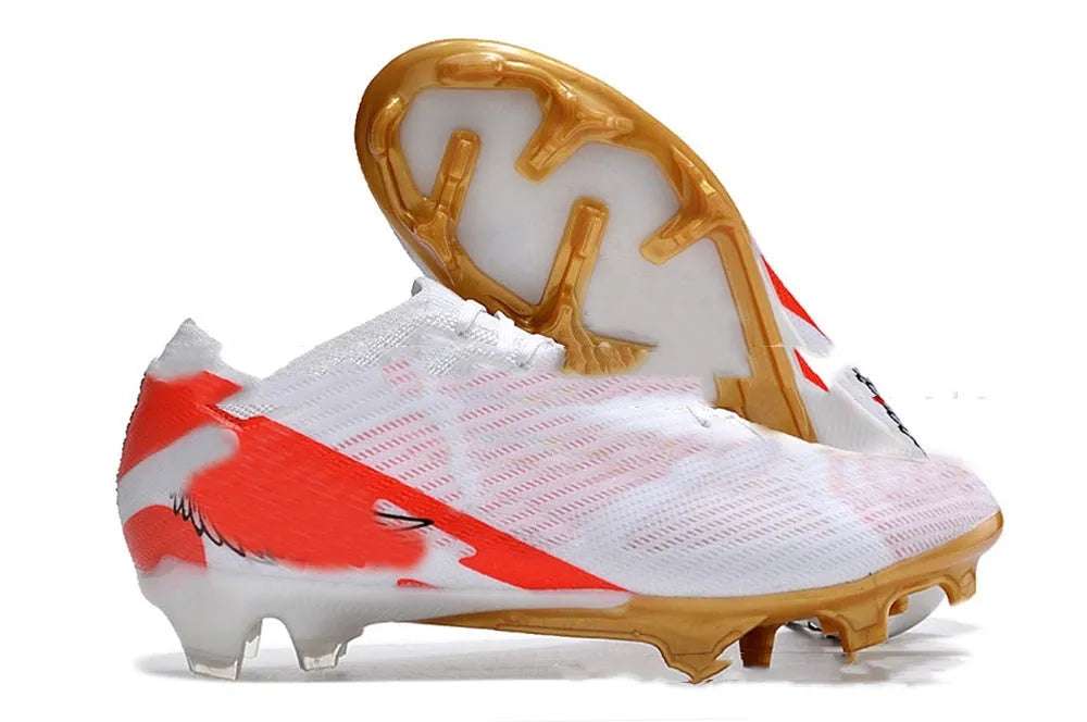 Men's low top waterproof knitted football shoes with FG rubber studs on white background