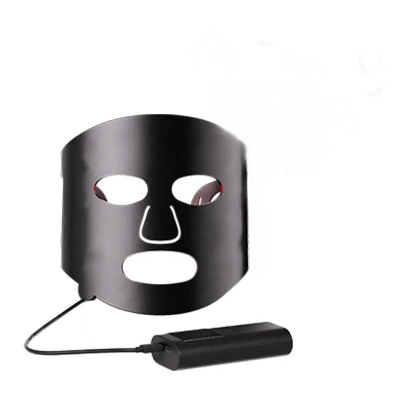 Black and gold LED phototherapy face mask with seven colour light modes for home skincare treatment.