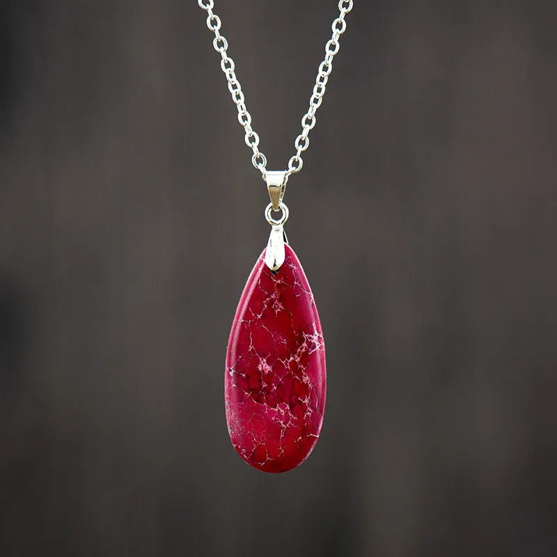 Jade pendant necklace with 18K gold-plated chain showing pendant design options