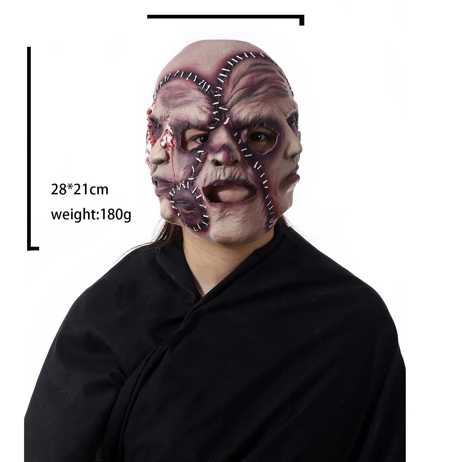 Three-sided grimace horror mask showing three distinct grotesque faces in natural latex