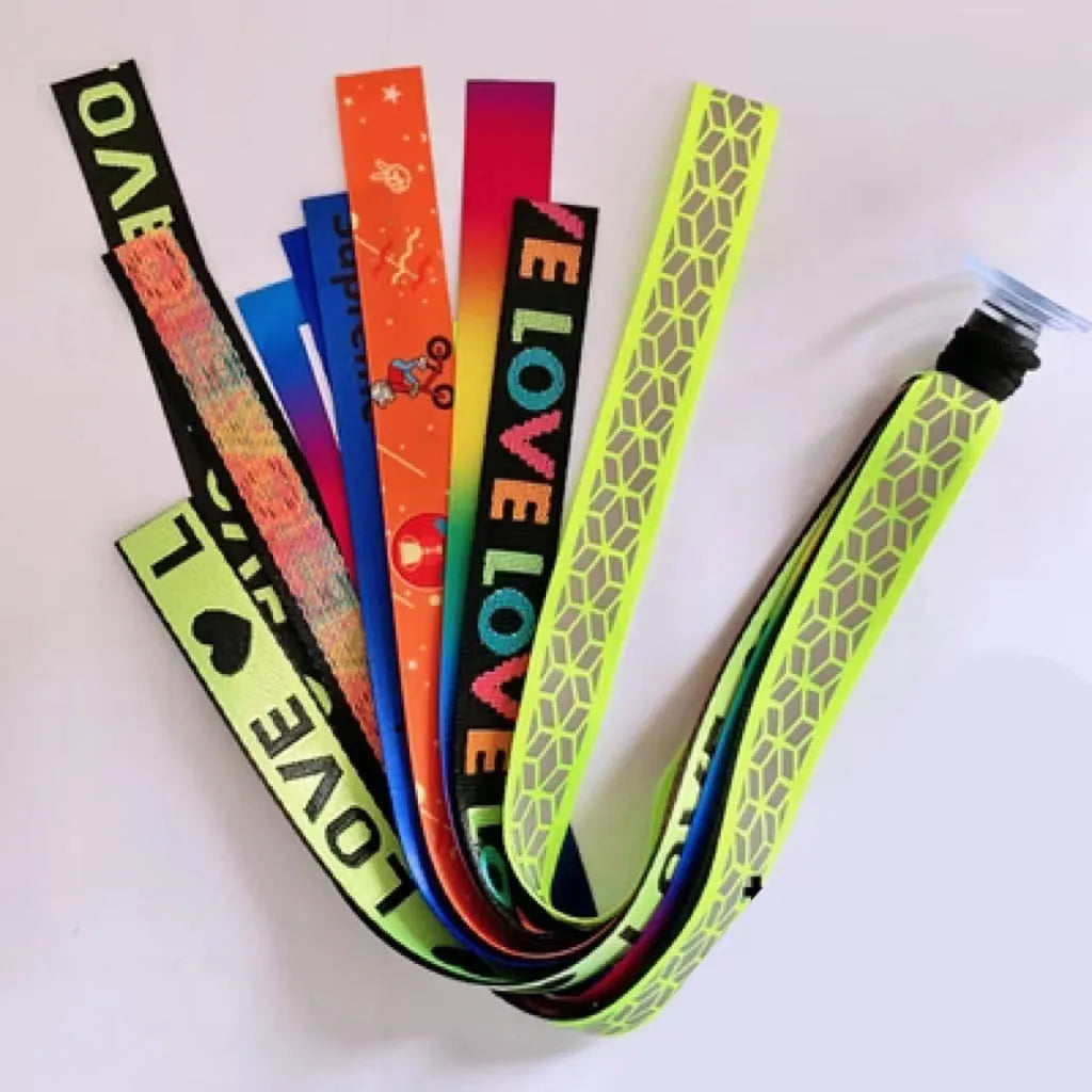 Close-up of a colourful decorative ribbon streamer attached to a child's helmet for roller skating or skiing.