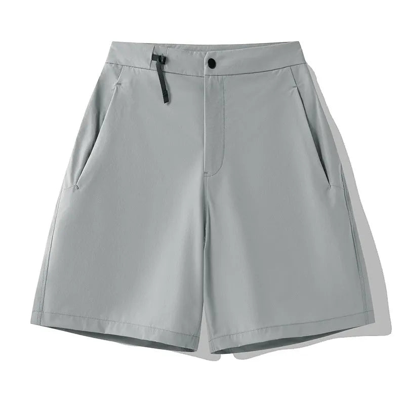 Men's quick-dry athletic shorts in khaki colour with four-way stretch fabric.