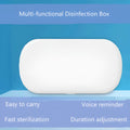White portable UV steriliser and wireless charging box with aromatherapy function on a desktop