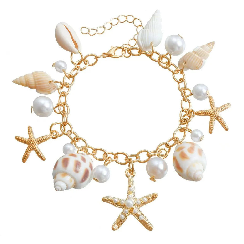 Women's alloy waist chain and matching bracelet set with star and shell design on a white background.