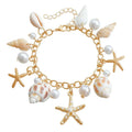 Women's alloy waist chain and matching bracelet set with star and shell design on a white background.