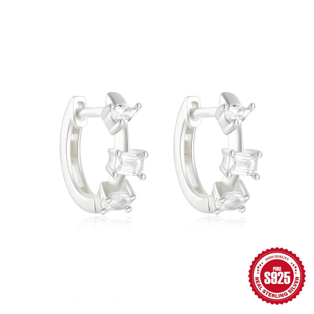 Sterling silver geometric stud earrings with diamond detailing in gold or silver finish