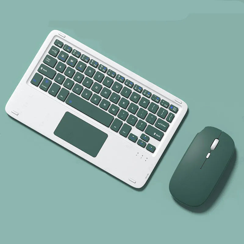 Pink wireless keyboard and mouse combo with slim touch keyboard and Bluetooth connectivity on wooden desk