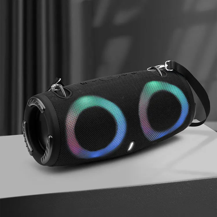Round portable Bluetooth speaker with RGB coloured lights in camouflage colour option with carrying strap