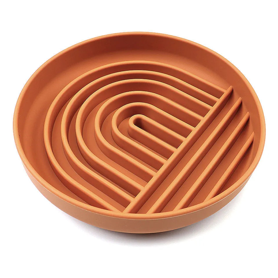 Silicone slow feeder dog bowl with ridge design, shown in beige colour, acting as a lick mat.