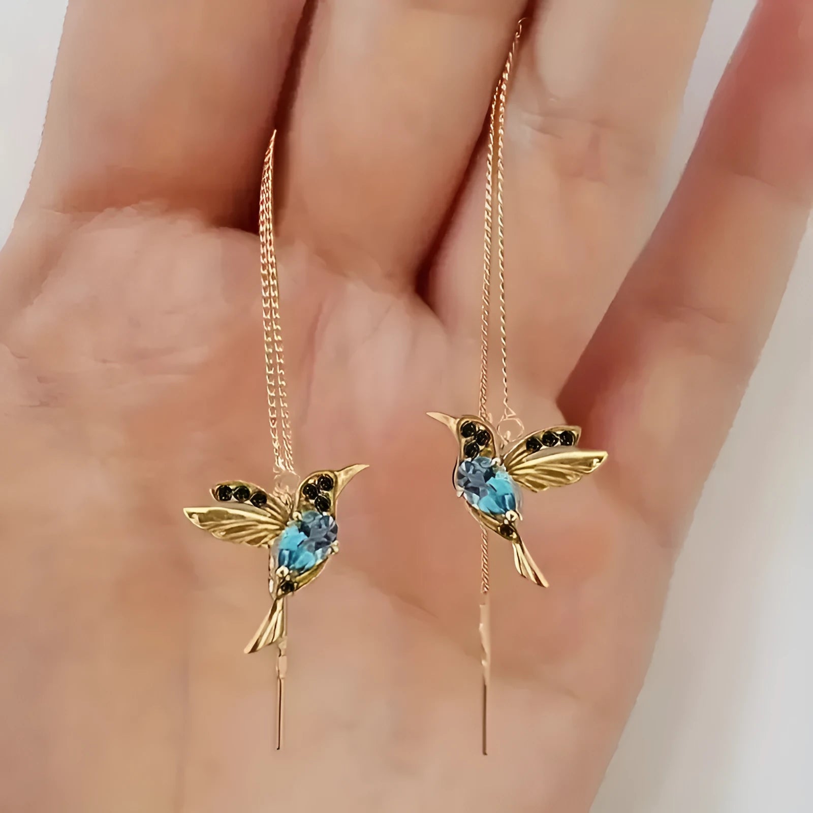 Women's hanging bird earrings with zirconium wing elements in blue, red, or red lvzuan colours