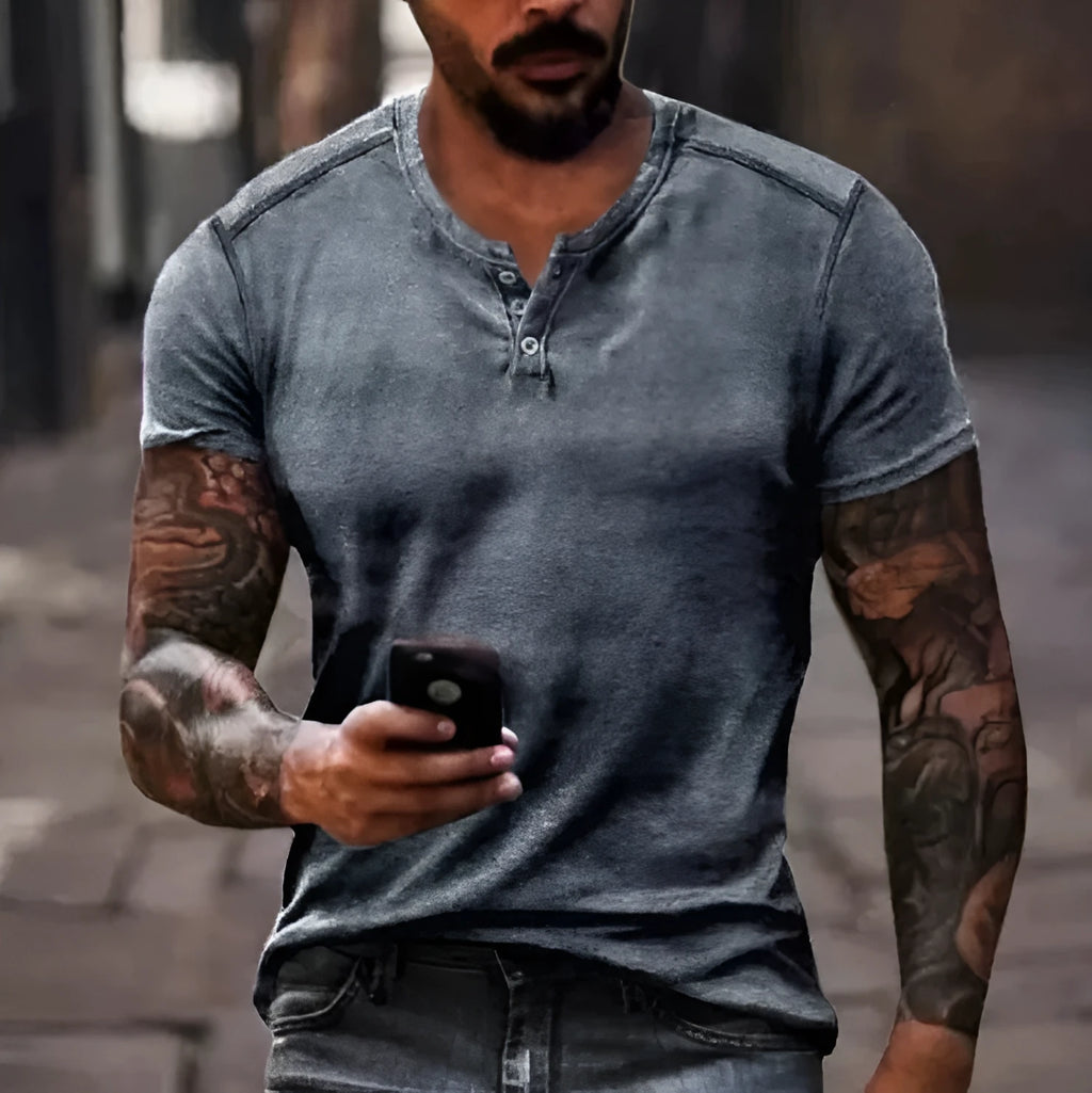 Men's light blue short sleeve sports t-shirt with a lapel and button front detail.