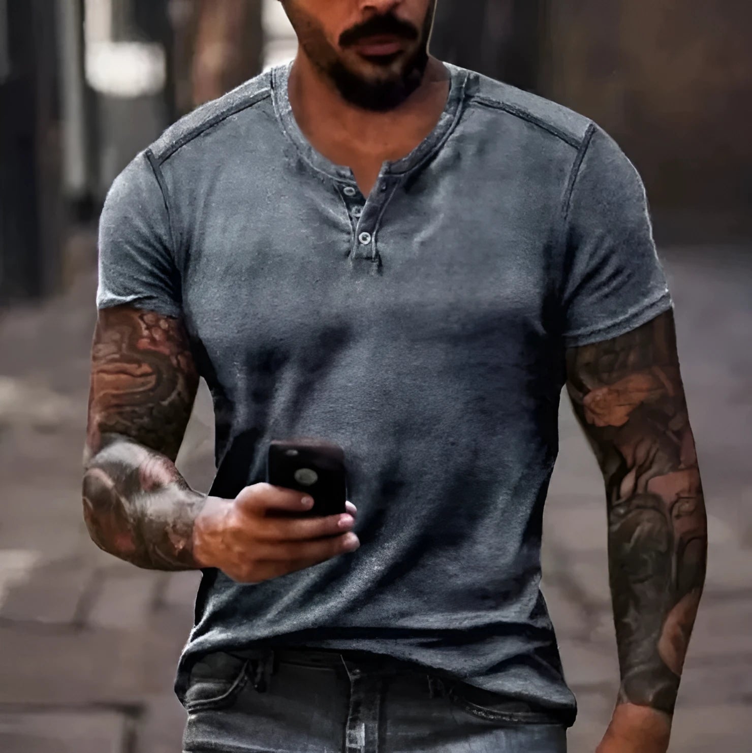 Men's light blue short sleeve sports t-shirt with a lapel and button front detail.