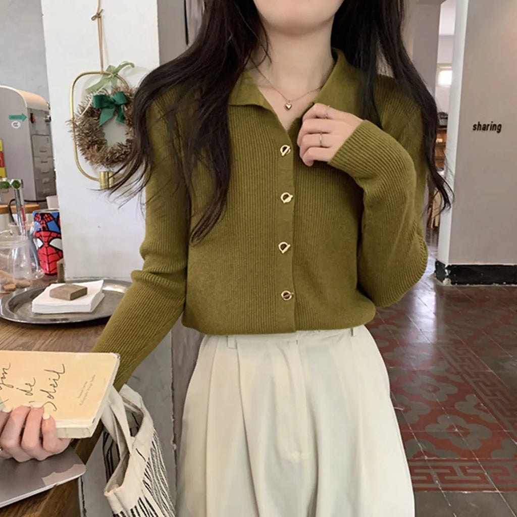 Beige viscose knitted cardigan with long sleeves displayed as bottoming top