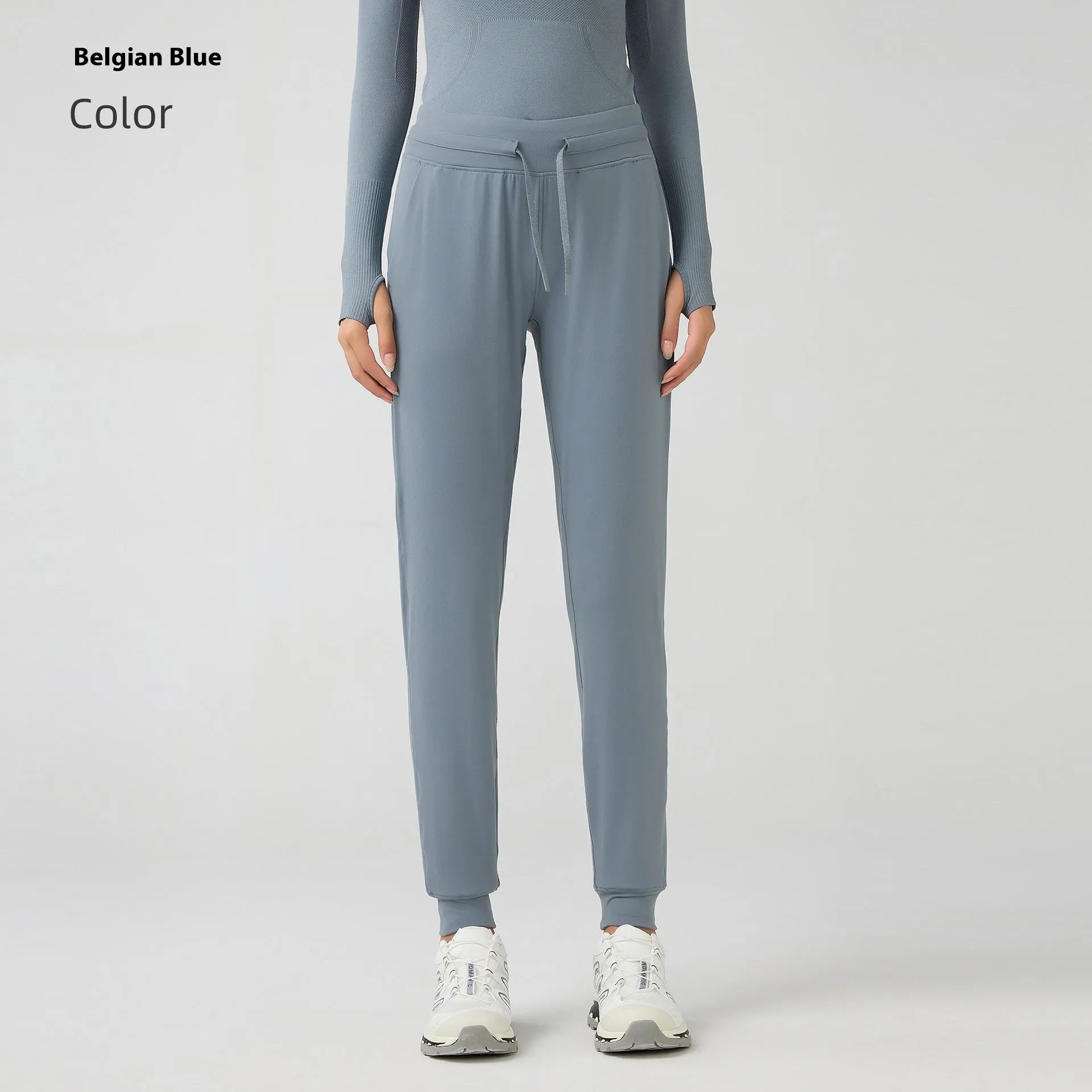 Women's high-waist yoga pants with drawstring waistband in distilled coffee colour, suitable for fitness.