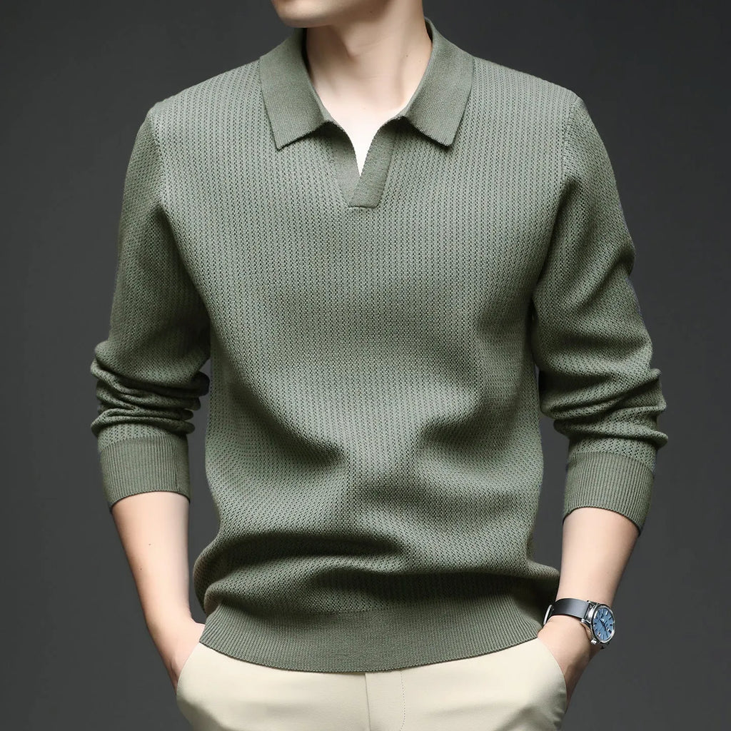 Men's loose fit plain pullover sweater in green, shown on a model for scale.