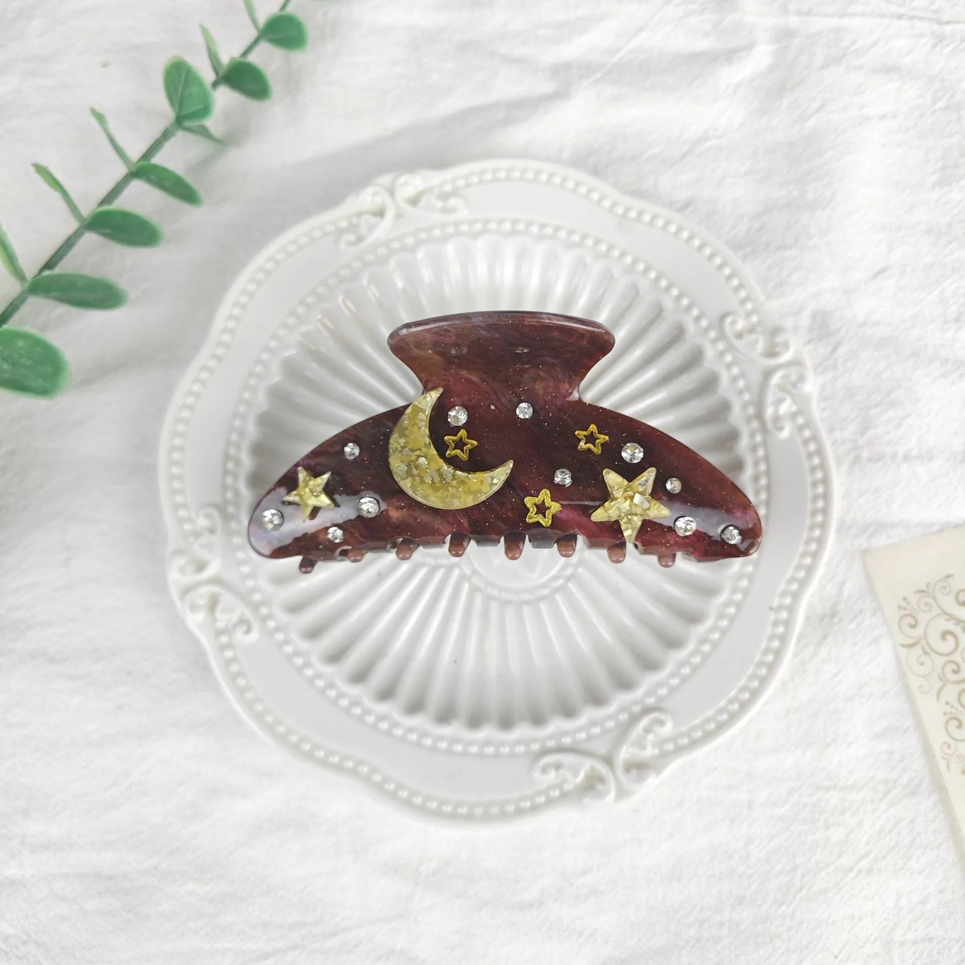 Oversized women's barrette hair clip with a starry sky pattern in sky blue.
