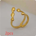 Adjustable brass opening ring with sphere design in gold colour for women