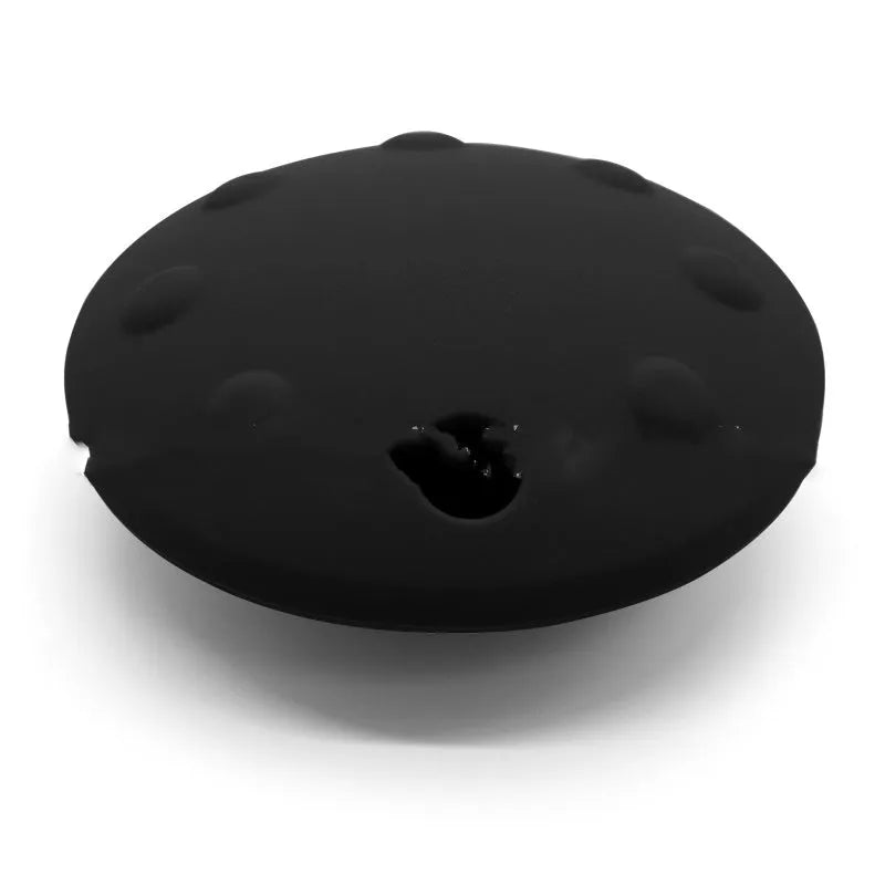 Pet drop-resistant silicone slow feeder frisbee in black, 120mm size, on white background