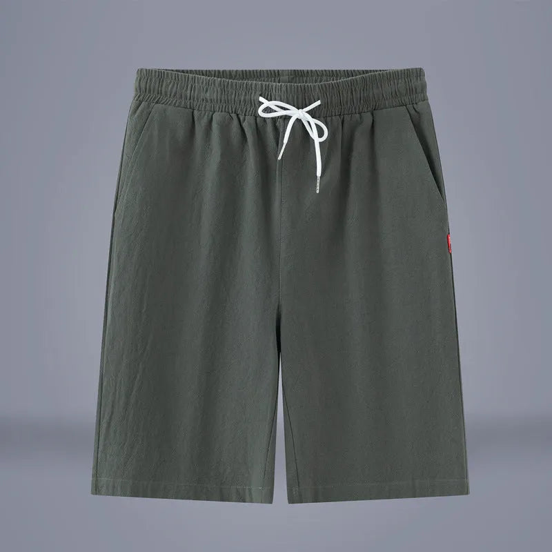 Solid colour cotton linen cropped summer pants with a drawstring waist on a hanger.
