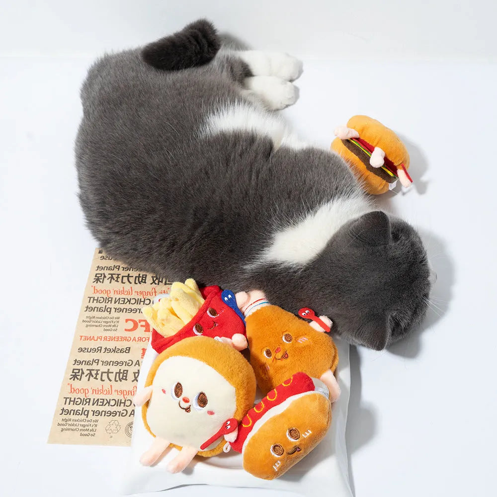 Set of five plush cat chew toys shaped like a hamburger, chicken leg, fries, bread, and hot dog.