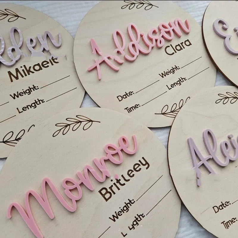 Square wooden newborn name label with birth information, 15x15cm, shown in three style variations.