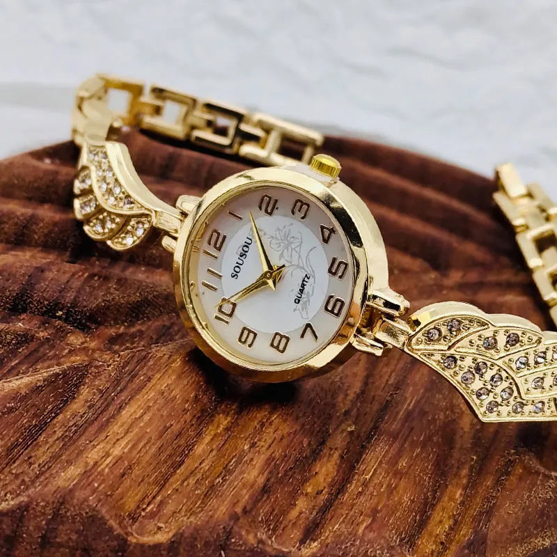 Women's stainless steel watch with round dial showing gold surface option and vachette clasp buckle