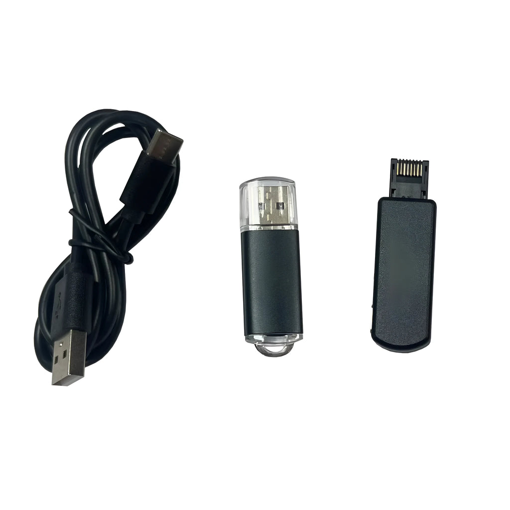 Black JB Tool USB host adapter with aluminum alloy body next to data cable and manual.