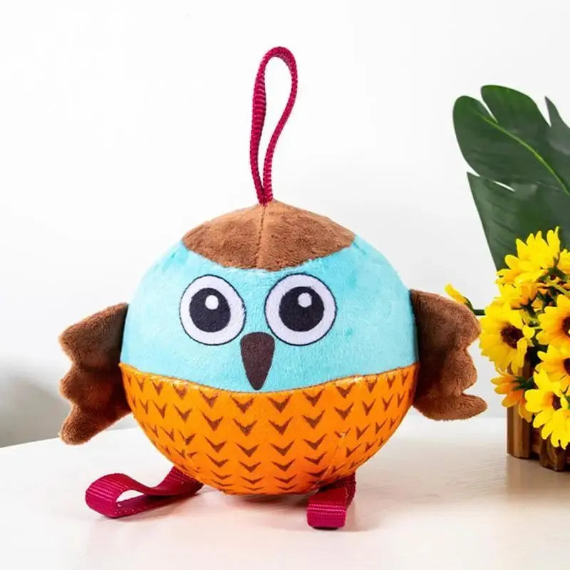 Orange interactive owl ball dog toy made from velvet and rubber for chewing and boredom relief