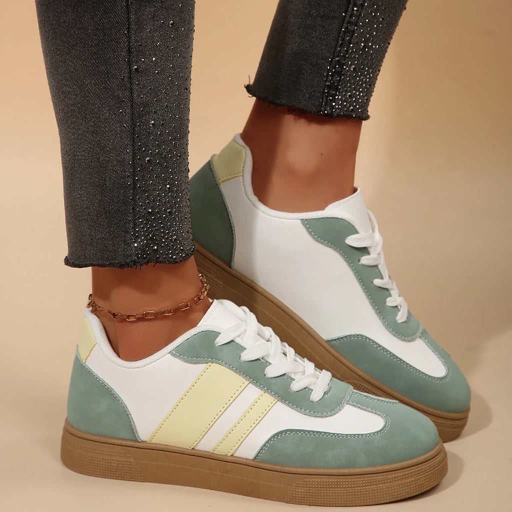 Green retro sports women's shoes with cross-strap design and low-top construction