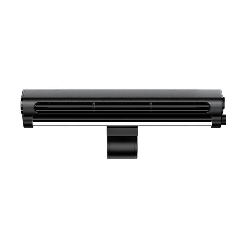 Black bladeless USB fan clipped to laptop screen with integrated lighting lamp showing brushless motor design