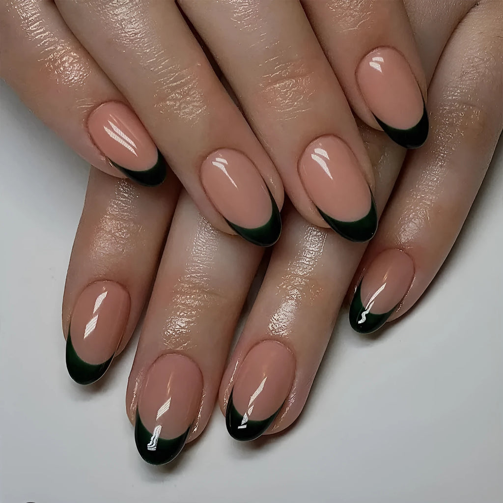 Set of 24 short almond-shaped false nails in a simple black French style design on a white background.