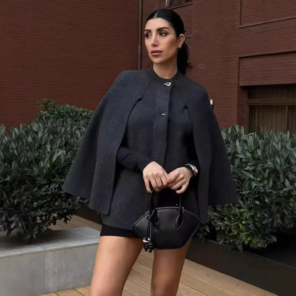 Cape round neck long sleeve knitted sweater coat in solid dark gray with regular sleeves for street fashion style