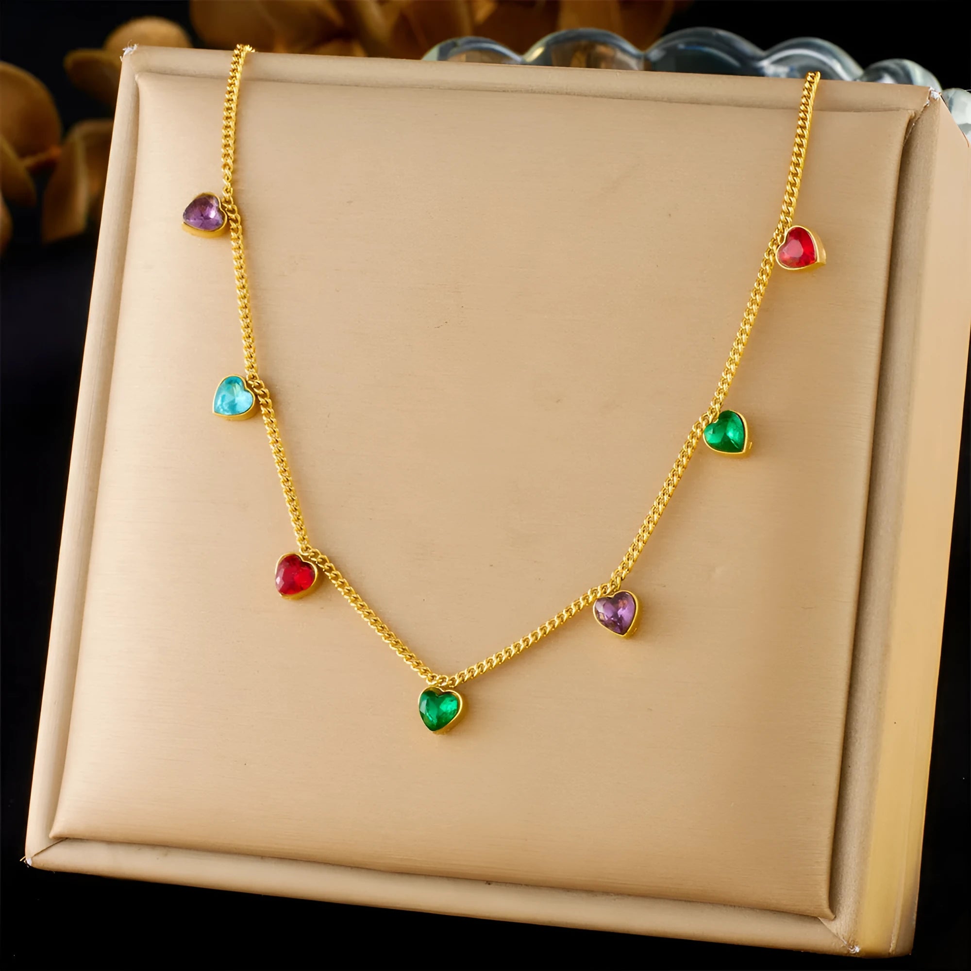 Women's gold-plated heart necklace on adjustable stainless steel chain showing love design element
