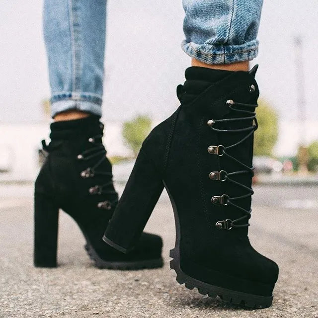 Women's suede ankle boots with thick heel in Roman style, showing decorative rivets and available in four colours