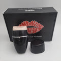 Black and white electric silicone lip plumper with USB charging cable