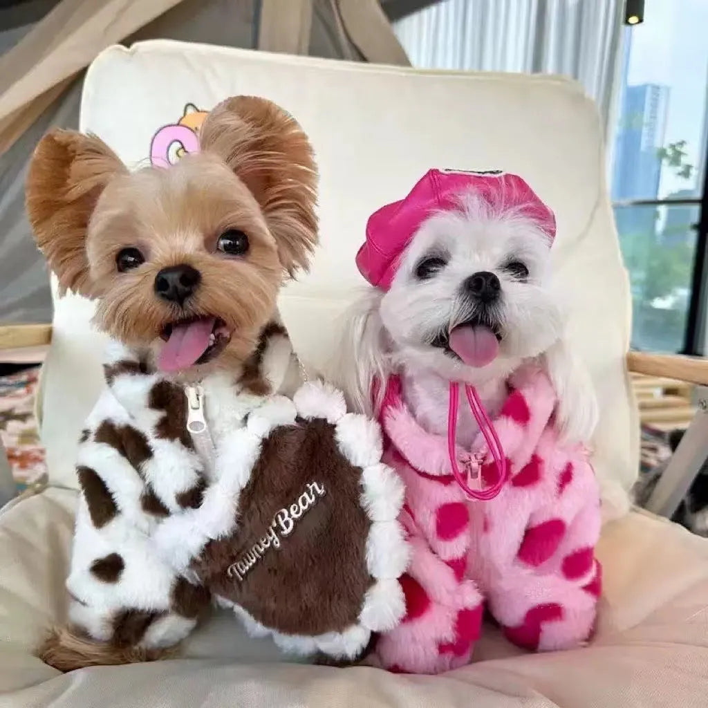 Small dog wearing plush polyester warm coat in British styling, available in pink or brown colour