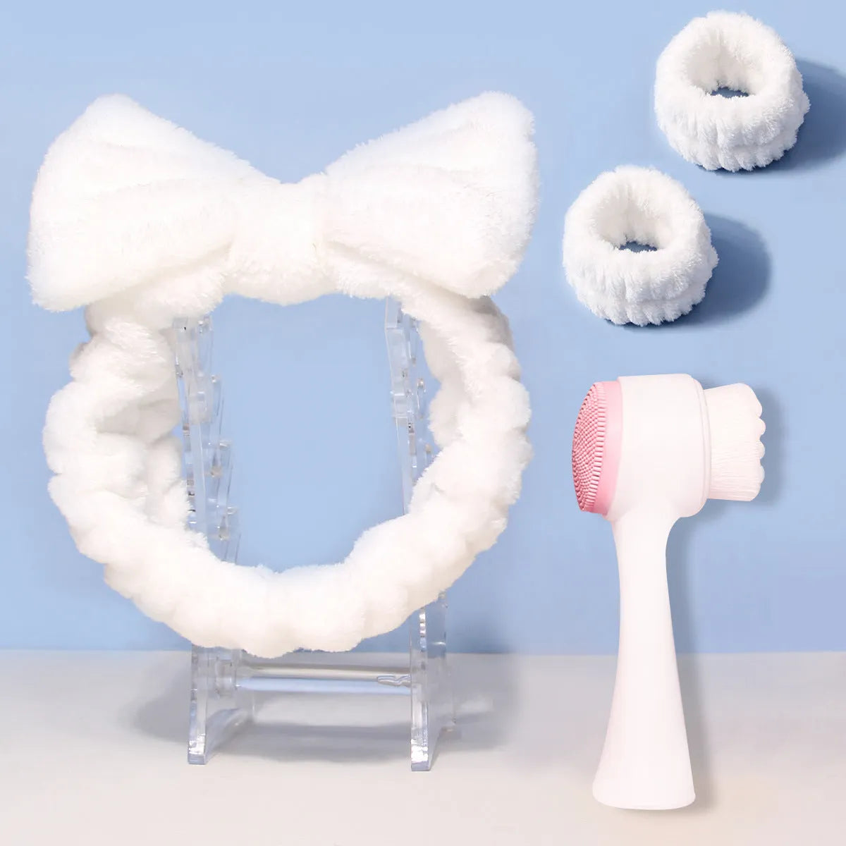 Facial brush set with coral fleece hair band, nylon brush, and face wash mitts in assorted colours