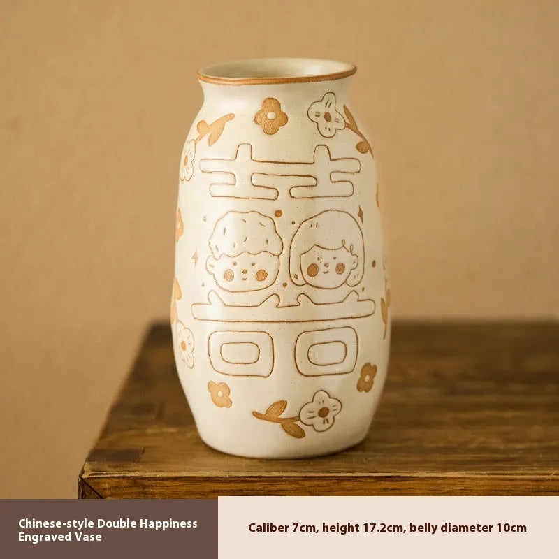 Chinese hand-painted ceramic vase with persimmon fruit designs on wooden desktop